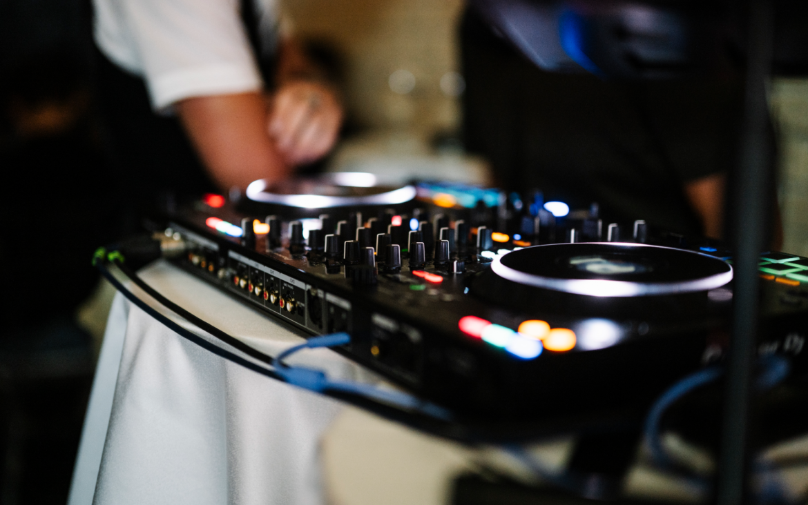 DJ equipment set up at a venue during a nightlife party.